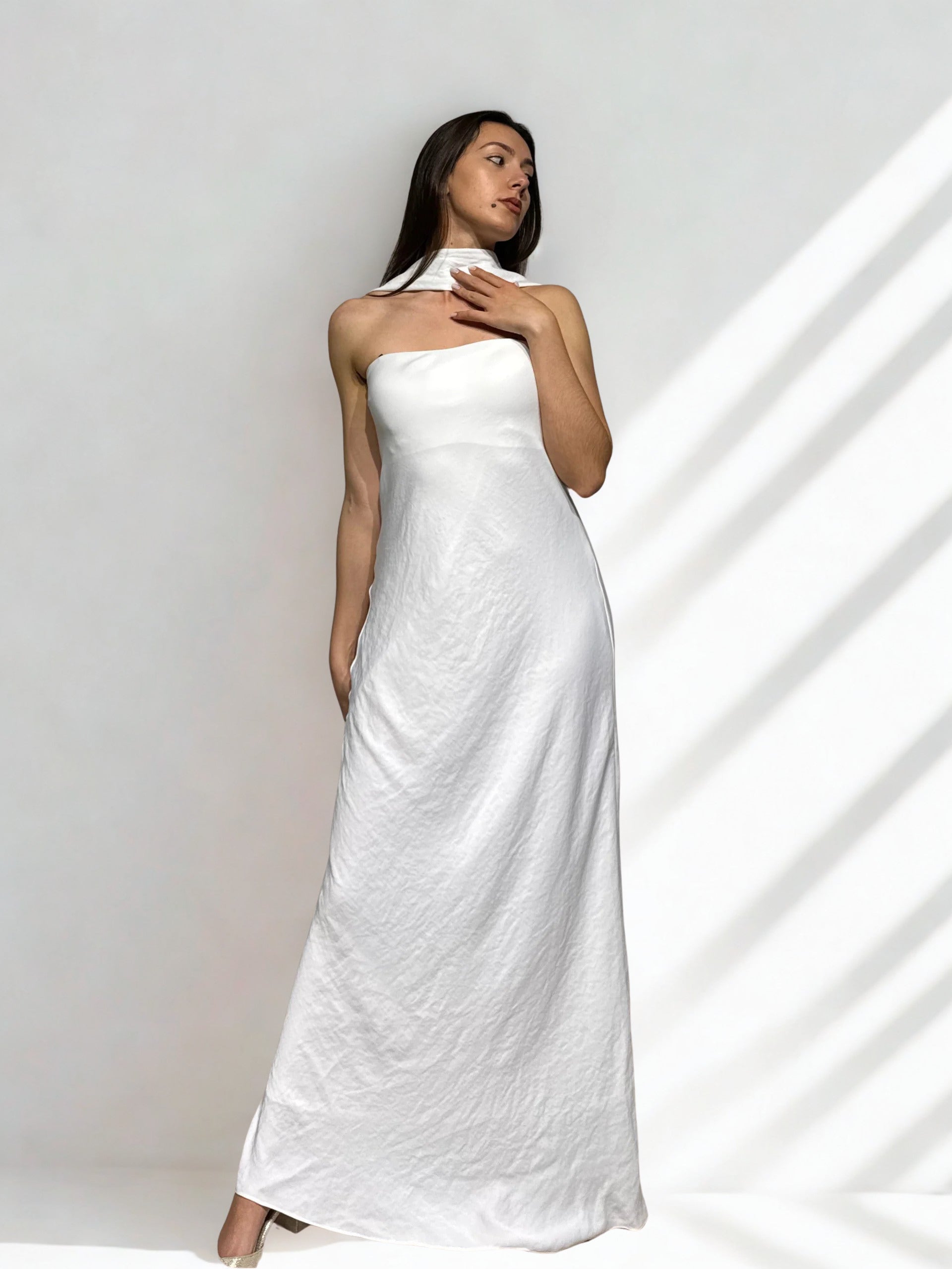 Sculptural Open-Back Gown with Ruffle Detail Arggido