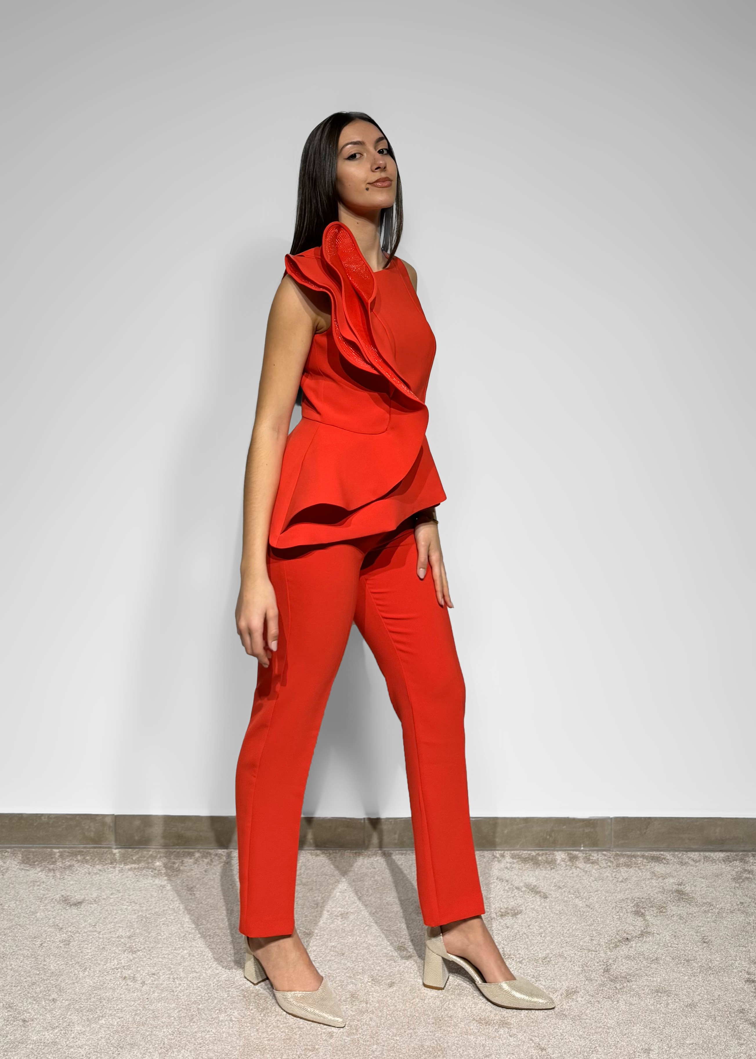 Conjunto com detalhe na blusa Carla Ruiz