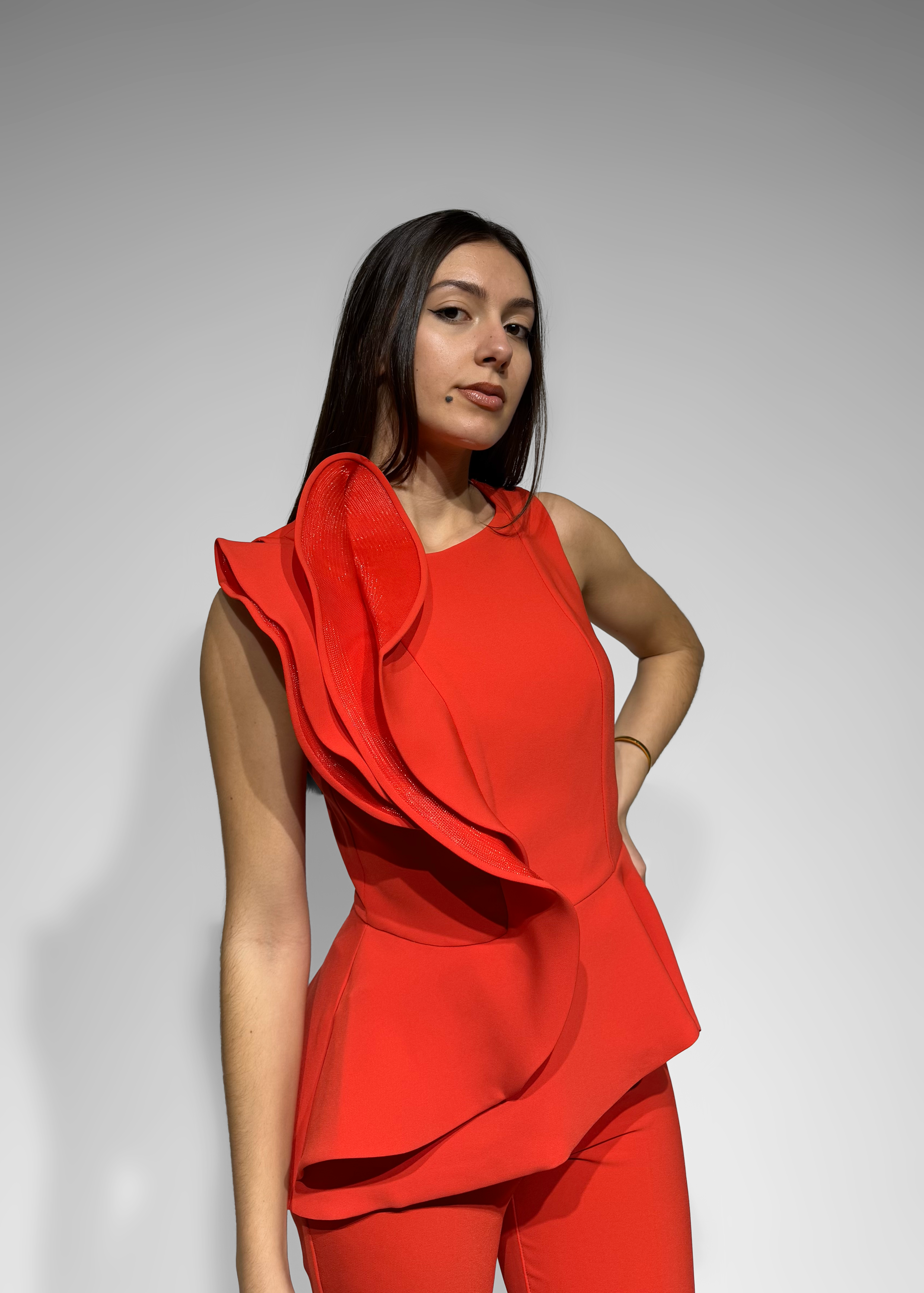 Conjunto com detalhe na blusa Carla Ruiz