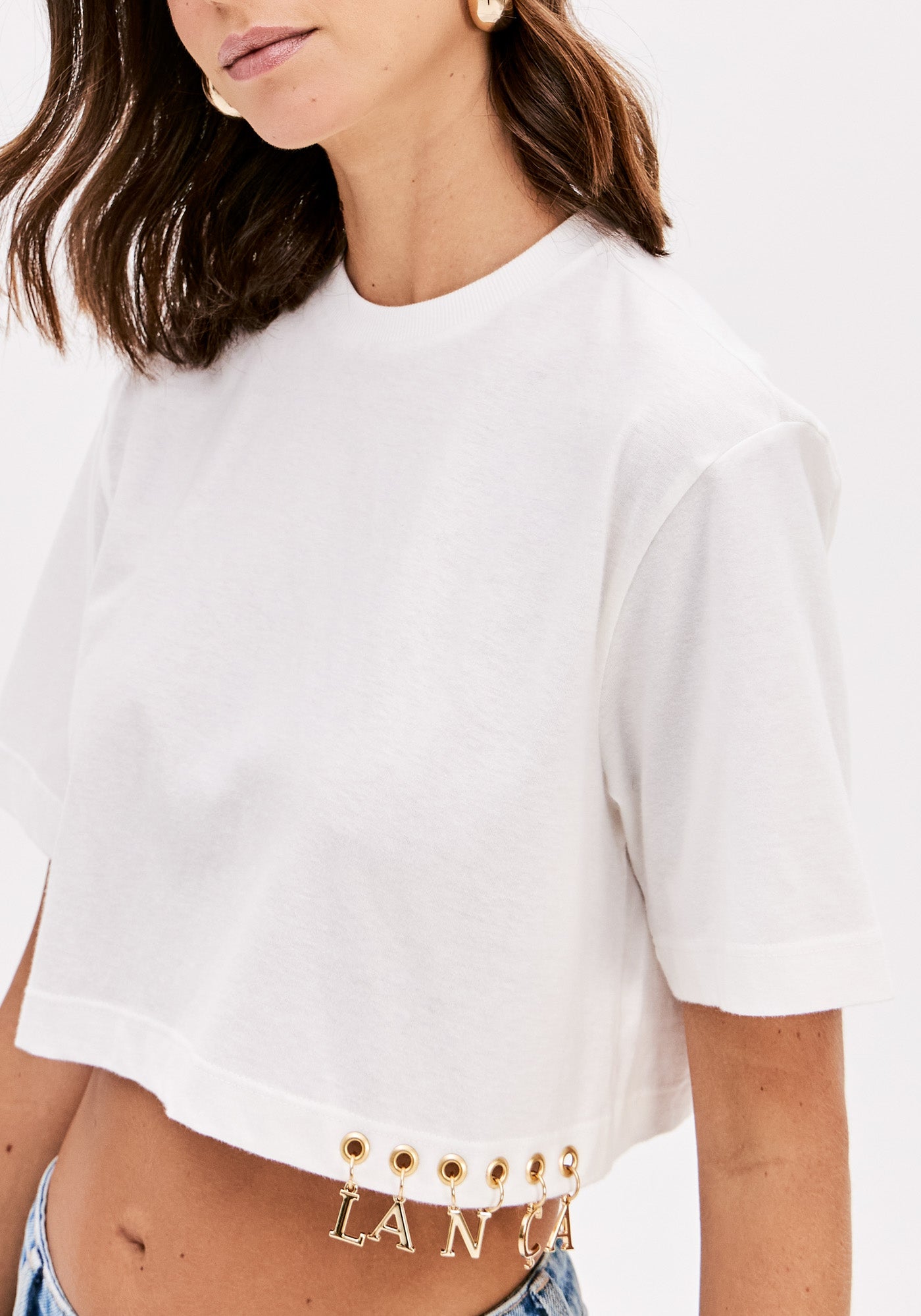 T-shirt Oversized com Detalhe Lateral de Marca Lança Perfume