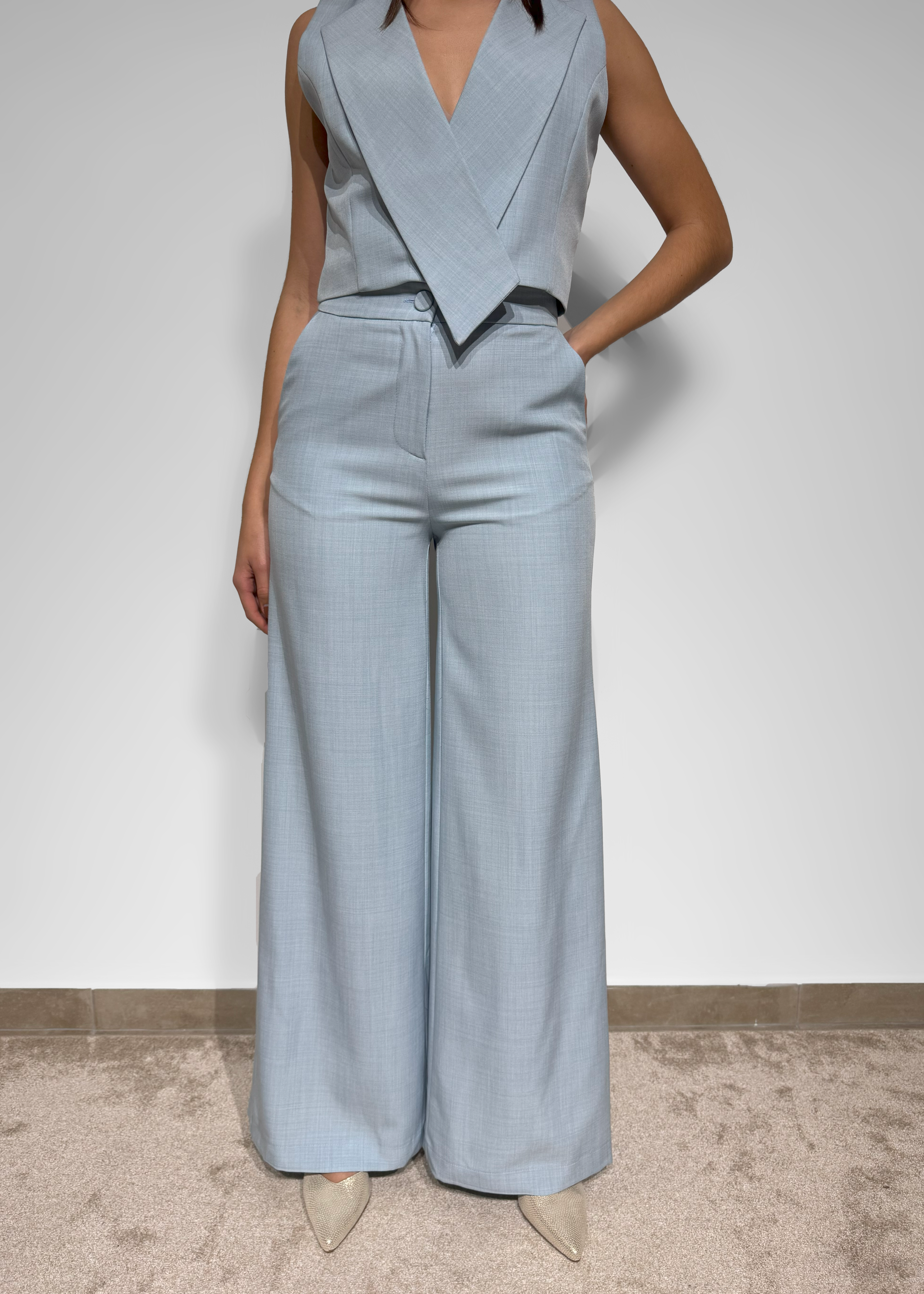 Calça pantalona em tecido Imperial
