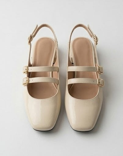 Sapatos de salto baixo em couro envernizado com fivela Ruika